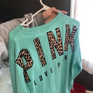 teal sweatshirt from pink